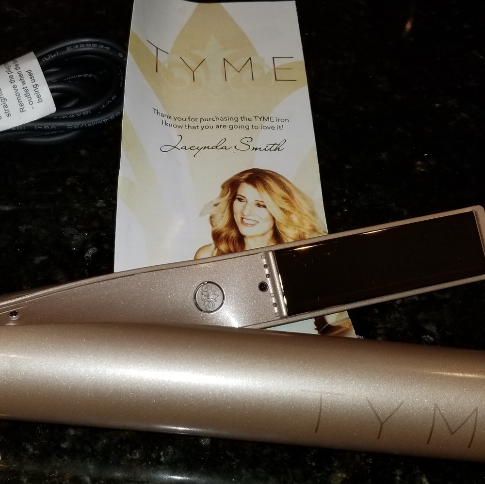 Tyme curling iron brand new